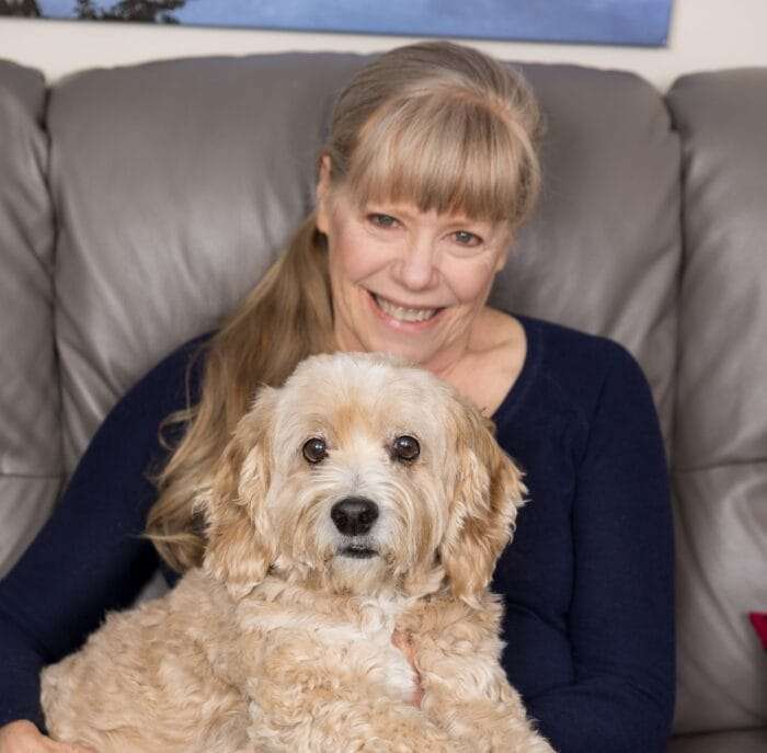 picture of naturopathic doctor pamela frank with her dog farley